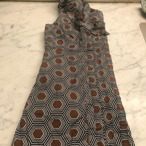 Tory Burch sleeveless blouse with pockets.